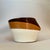 Signed by ULUV, made in Czechoslovakia and dating to the 1970s, this sculptural ceramic ashtray features an asymmetric rim...