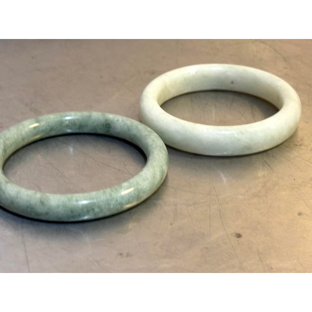 1920s-30s Chinese celadon jade & spinach jade bangle bracelets; set of two. Excellent condition.