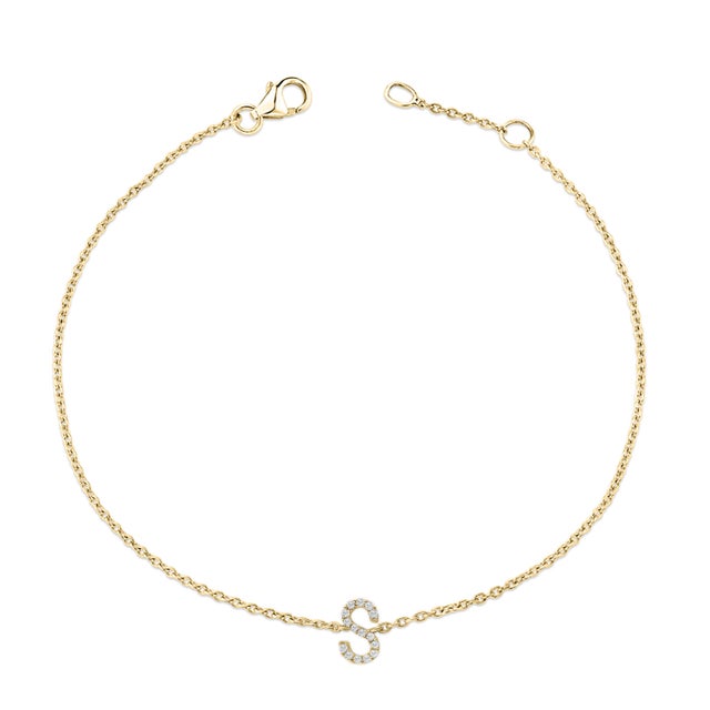 Immerse yourself in the understated elegance of this 10K yellow gold bracelet, for an enrapturing shimmer that captures...