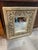 Beautiful floral motif ornate carved mirror with a gold wash Measures 22 1/4 inches wide by 25 inches tall and one and...