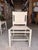Add timeless sophistication to your dining space with this contemporary dining chair, upholstered in luxurious cashew...
