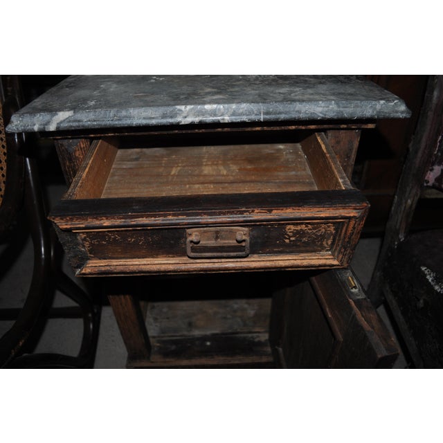 Old German marble-top nightstand or end table. Old German marble-top nightstand or can be used as end table - has a single...