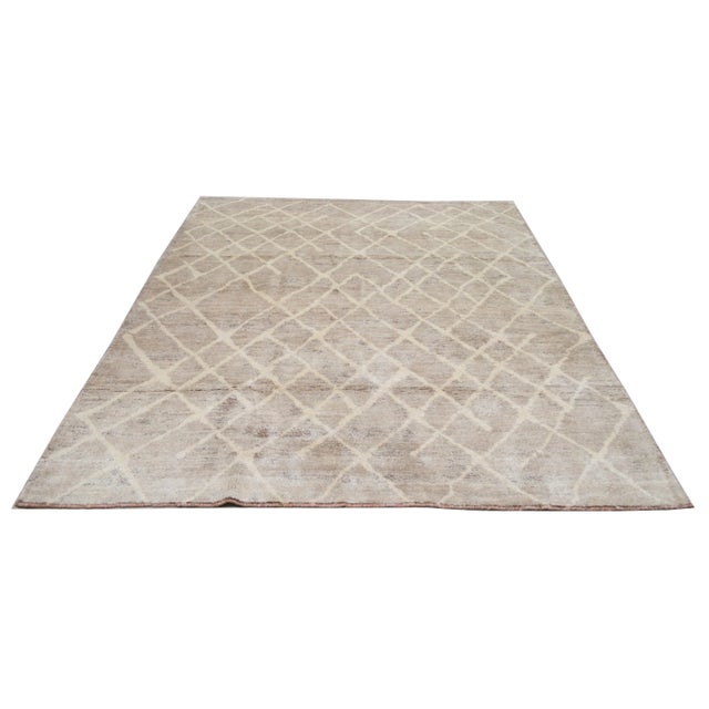 Moroccan Beni Ourain hand knotted rug with natural colors, contemporary style and soft texture.