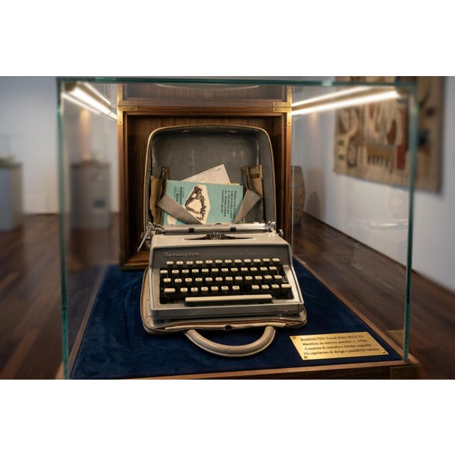 Stunning remington travel-riter deluxe portable typewriter, an icon of early 1960s industrial design. This model is...