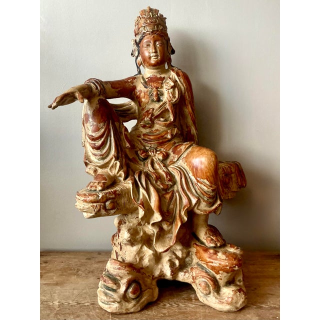 Infuse your sanctuary with a profound sense of serenity and spiritual history with this monumental vintage hand-carved...