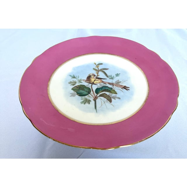 An exquisite and highly collectible 19th-century French Old Paris (Vieux Paris) porcelain compote/tazza dessert stand....