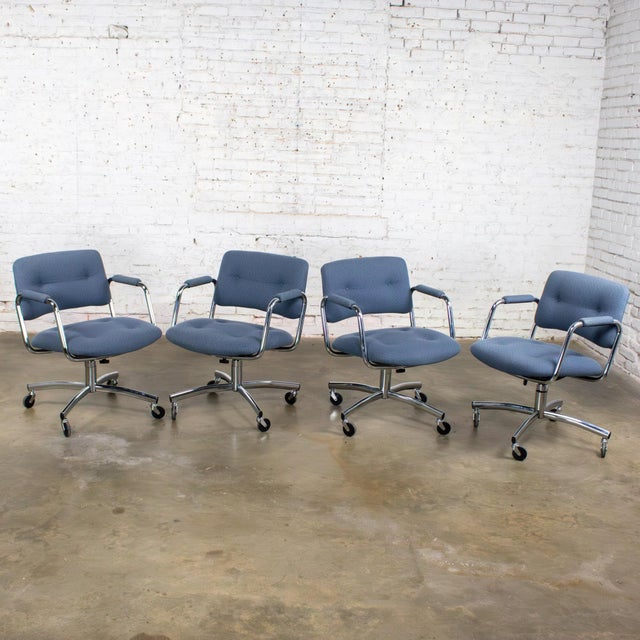 Marvelous vintage Modern set of 4 Steelcase dining or game armchairs composed of swivel, manual height & tension...