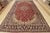 An authentic vintage traditional Najafabad rug hand-knotted with fine wool and natural dyes. This rug features a central...