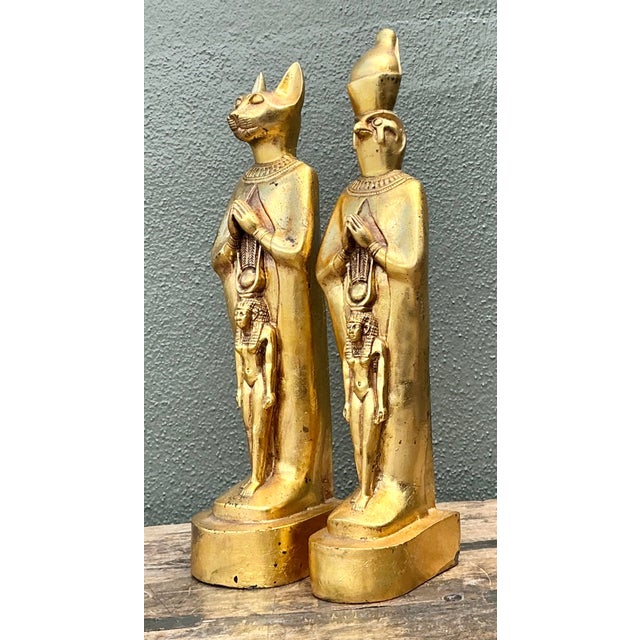This captivating pair of Egyptian Revival figurines offers a regal touch to any curated interior. Depicting the revered...