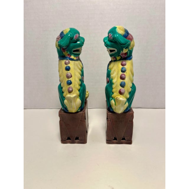 Pair of Vintage Chinese Hand Painted Glazed Pottery Foo Dogs Marked Aprox. dimensions: 8"H x 3.5"W x 2"D Very good...
