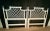 Offered is a pair of rare iconic lattice Ficks Reed twin headboards. They are pure white, despite the weird coloring in...