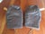 Rare pair custom made circa 1930s thumbless leather boxing gloves. The pair feature wooden inserts which fit within...