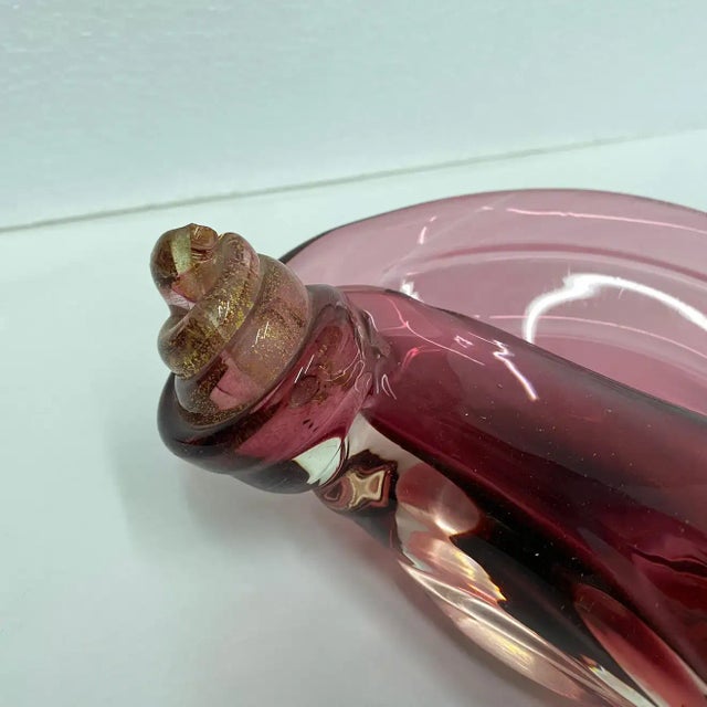 A lovely purple and gold murano glass ashtray in the style of Barovier. It has totally hand-crafted in Venice in the...