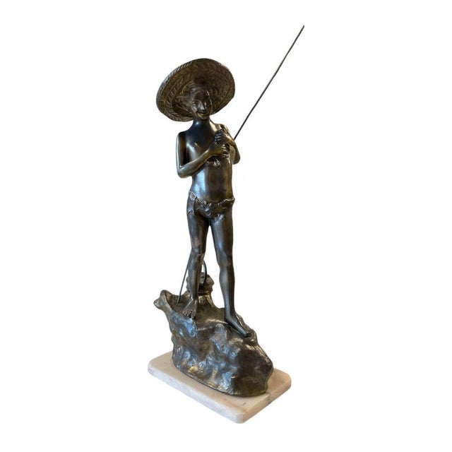 Giovanni Varlese (1888-1922, Italy) – Bronze Figure of a Young Fisherman. Bronze figure on a marble base, signed G....