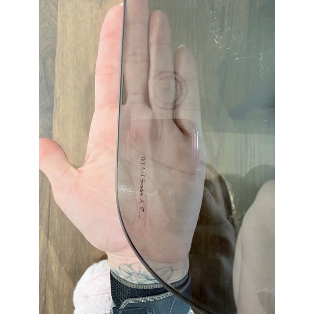 A rare and versatile vintage IKEA smoked glass modular coffee table set, made in Sweden, featuring a sculptural...