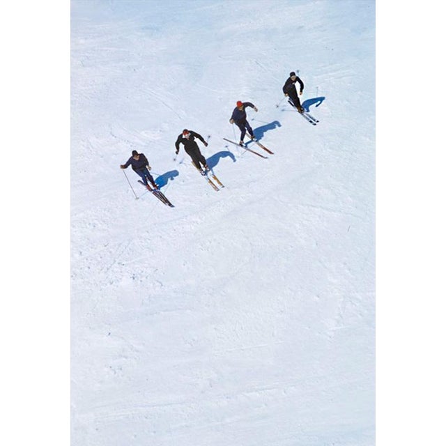 On The Piste by Toni Frissell Four skiers race downhill at the Stowe Mountain resort, Vermont, USA, 1955. (Photo by Toni...