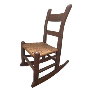 Early 20th Century Antique Wood Child’s Rocking Chair With Basket Weave Seat For Sale