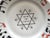 Here is a rare late 19th Century-early 20th Century painted and stenciled Jewish plate with a Yiddish greeting. A rare...