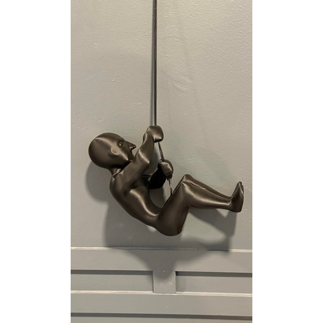 Climbing Man 10 Inch Tall Black Wall Art Home decor Unique item and definitely a conversation starter !! Must have for...