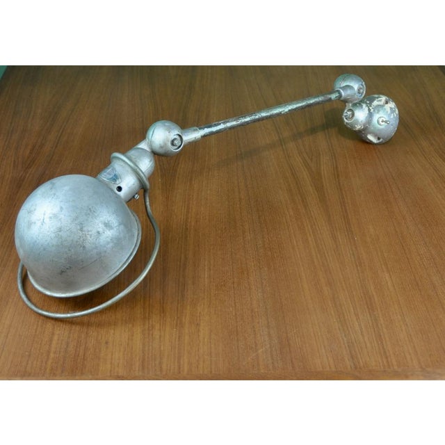 Industrial Jielde One-Arm Lamp by Jean-Louis Domecq for Jieldé, 1950s, in Good conditions. Designed 1950 to 1959 This...