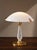 An extraordinary and highly collectible mid-century modern mushroom table lamp produced by the prestigious aureliano toso...