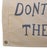 Custom-tailored all-cotton canvas nautical beachy flag that reads "DON'T GIVE UP THE SHIP" in tan with navy blue...