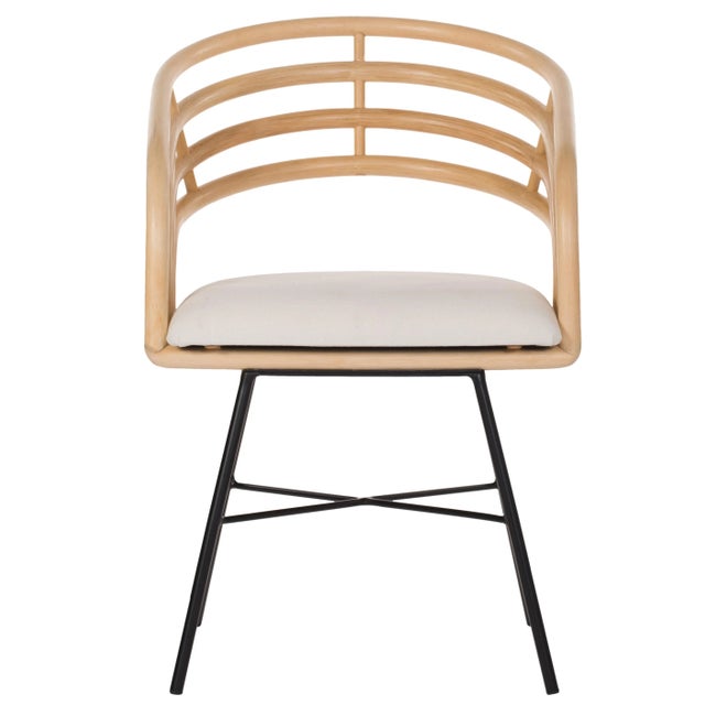 A modern addition to any space, the Madrid chair features a rattan and wood frame with steel legs. The tight seat cushion...