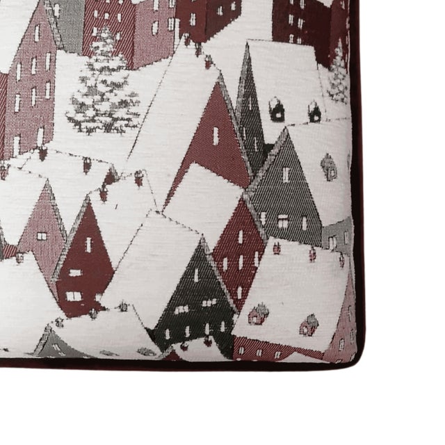 Meticulously handcrafted in the United Kingdom, this upholstered stool boasts classic studding and hand-polished solid...