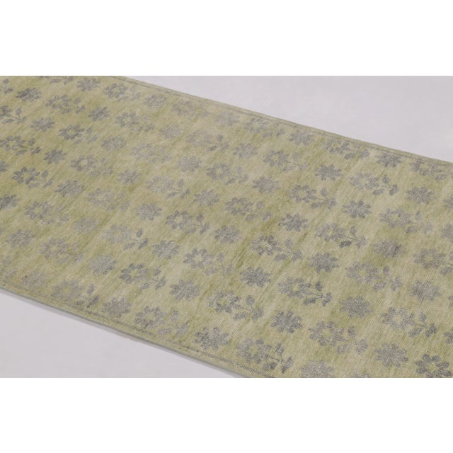 This 3 x 5 contemporary block print rug from India presents a refined interpretation of traditional textile patterning...