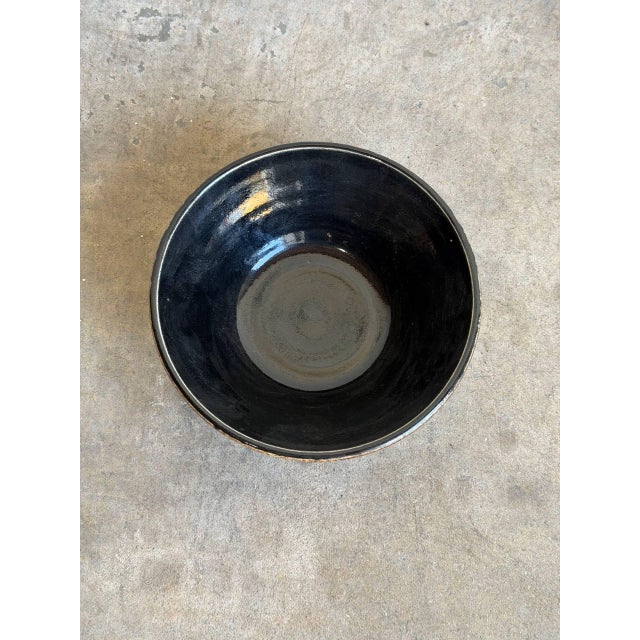 Vintage 1990s Danish Modern studio ceramic bowl highlights an organic, earthy aesthetic by artist Camilla Justesen. The...