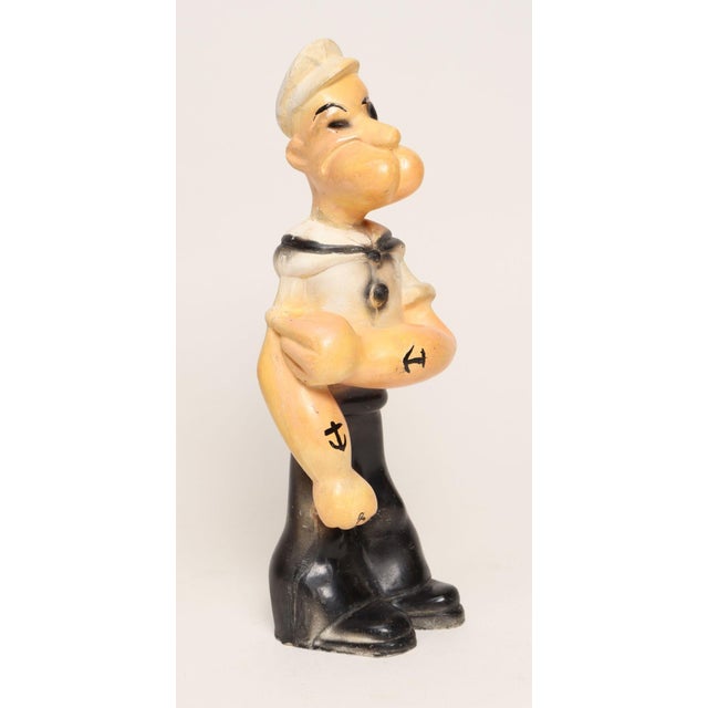 Circa 1930s American painted chalkware "Popeye" figurine depicting the character in his signature attire - sailor hat and...