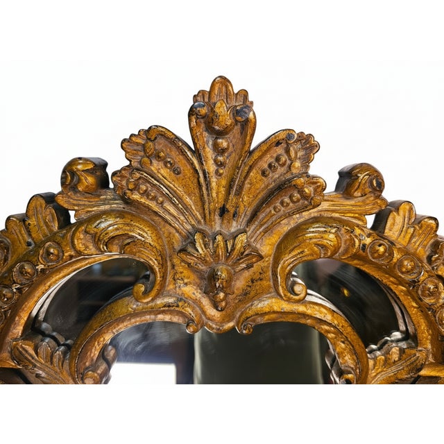 An exceptional and monumental vintage Baroque-Rococo Revival arched pier Raschella Collection mirror, boasting the exact...