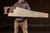Oversized antique trade sign modeled after a traditional carpenter's hand saw and advertising the “Spearior” line of...
