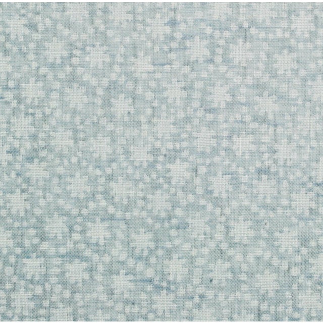 Small scale floral fabric featuring a delicate patterning of drops and dots. 100% linen face, knit-backed so it's suitable...