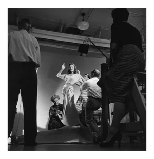 Elaine Stewart Being Photographed by Ray Jones 1953. Photo by Sid Avery