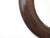 This 19th Century polished wood round mirror is 24" diameter.