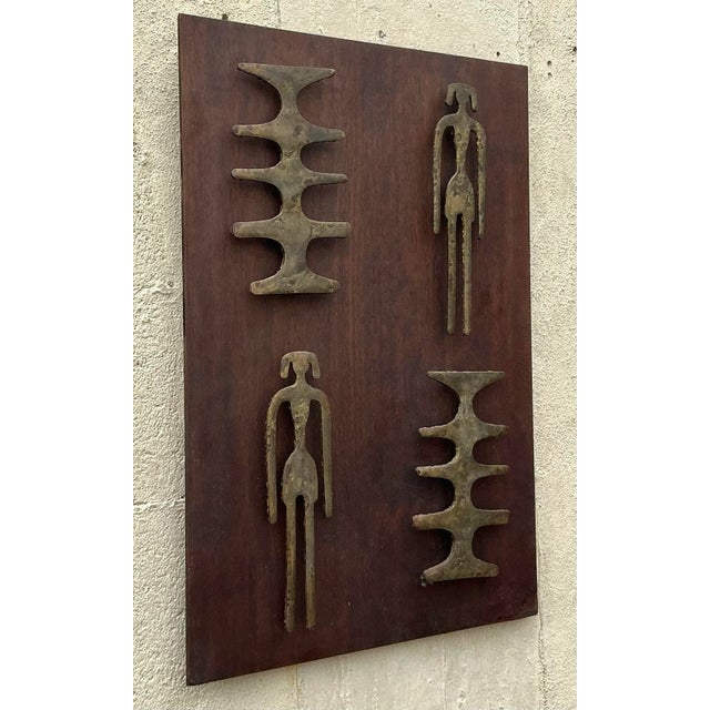 Add a striking focal point to your home with the Vintage MCM Hammered Bronze Shapes Wall Sculpture. This captivating piece...