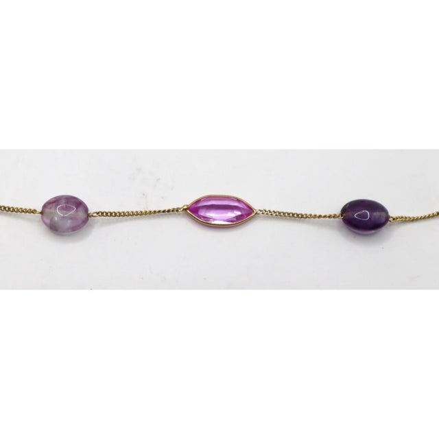 Elevate your jewelry collection with this exquisite 14K yellow gold necklace featuring a harmonious blend of elegance and...