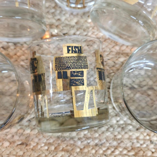 ✦ A signed Couroc of Monterey phenolic resin fish tray with a complete set of eight matching gold-decorated rocks glasses...