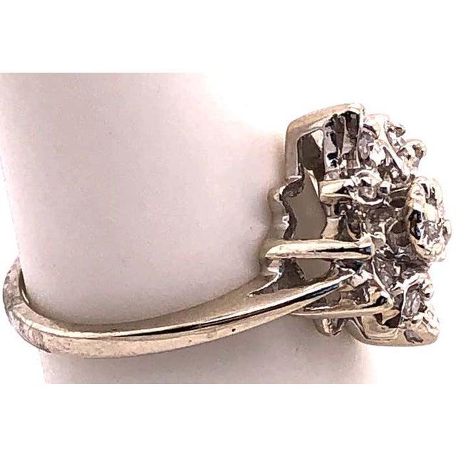 14 Karat White Gold Contemporary Ring with Diamonds 0.33 Total Diamond Weight. Size 5.75 3.29 grams total weight.