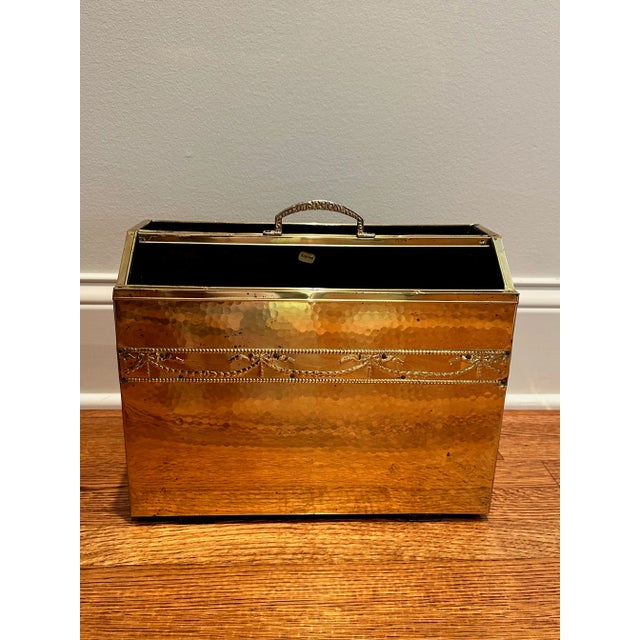 Elegant English Mid-Century Magazine Rack Add timeless sophistication to your space with this vintage hammered brass...