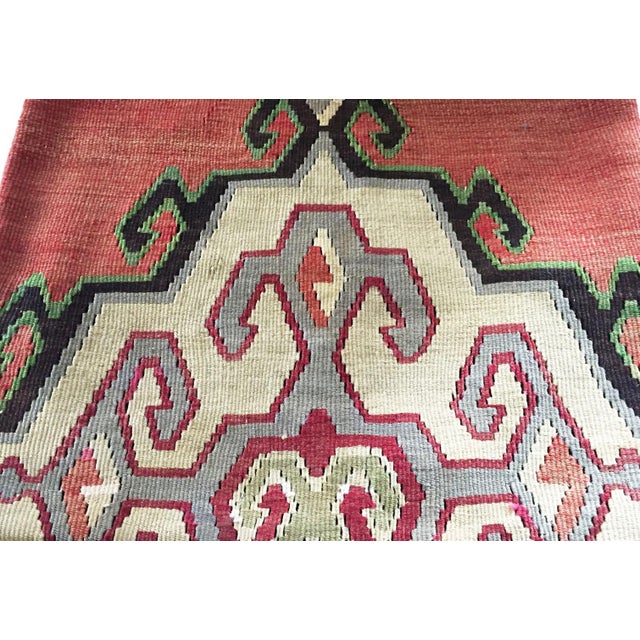 A superb custom-made pillow cover made from an authentic old Turkish tribal kilim rug. Features vibrant Pastel colors and...