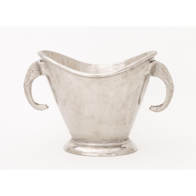 Elephant Head Motif Aluminum Champagne Bucket, the two masques handles. 9.25" H x 13.5" W x 8" D. Provenance: From a New...