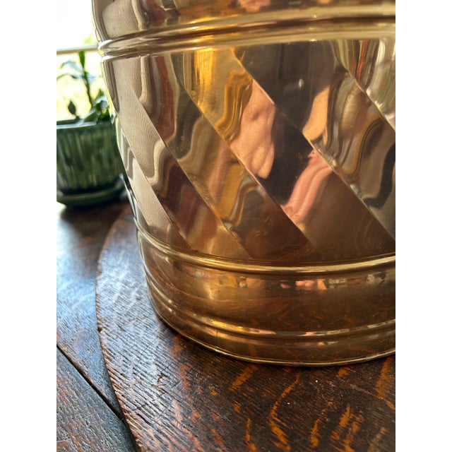 This brass planter or cachepot is the perfect size for an indoor plant. …. Not too large and not too small. The soldered...