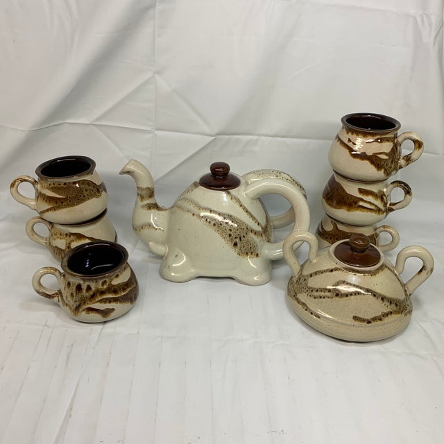 Rustic Vintage C. 1970s Handmade Stoneware Elephant Tea Set With Sugar Bowl, Brown and Cream Glaze - Set of 8 For Sale - Image 3 of 10