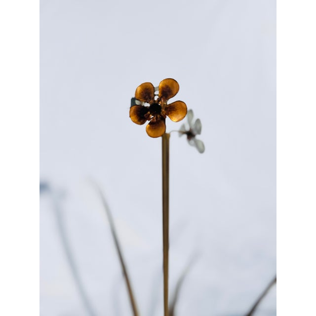 Striking vintage metal flower sculpture by Bovano of Cheshire, featuring elongated metal leaves radiating from a...