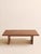 This vintage Mid-Century Modern walnut coffee table features a clean, architectural silhouette with a generously scaled...