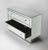 Dressed in true urban sophistication, this dresser is sheathed in mirror, even the deep, platform base. Handcrafted...
