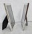 Matching pair of sterling silver photo frames. Marked to the frame Reed & Barton Sterling. Measurements are 6" by 8"...