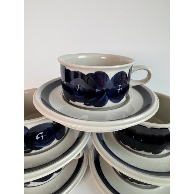 These cups and saucers just say "mid century modern." A modern design from the 1950's that is standing the test of time....